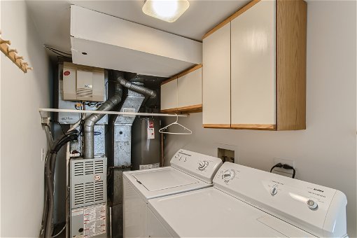24 Lower Level Laundry Room.jpg